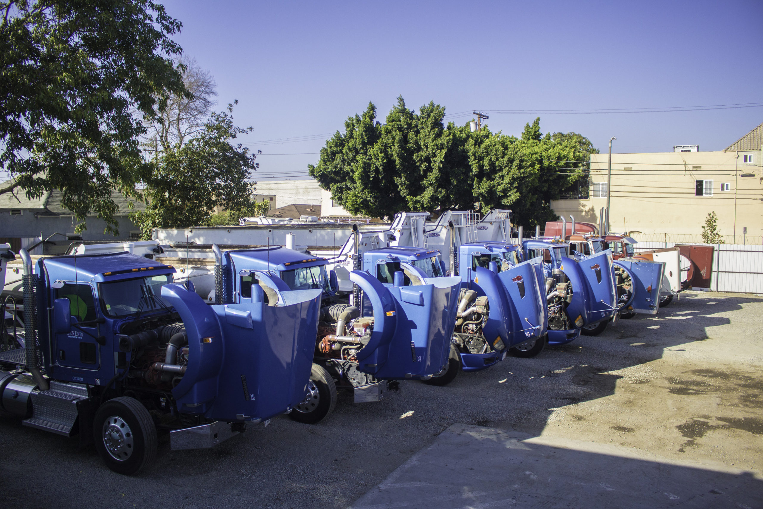 Genesis Dispatch fleet of blue trucks